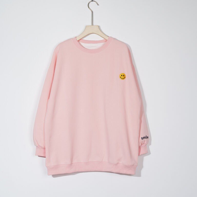 Yellow smiley face sweater (1)